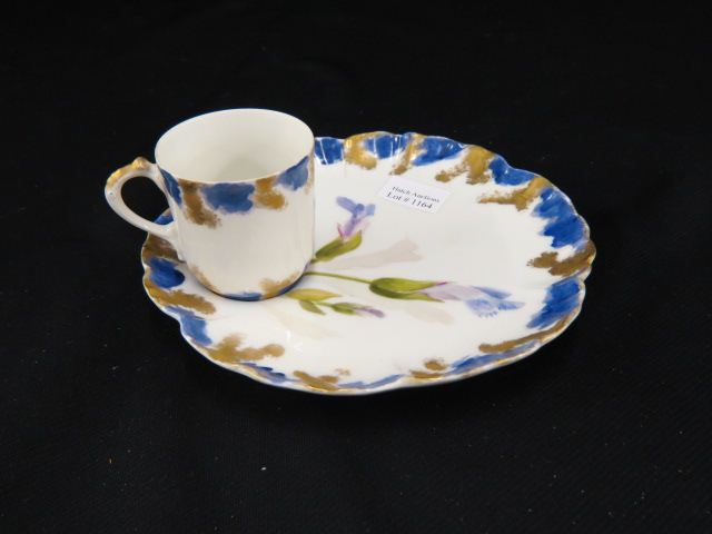 Appraisal: Limoge Porcelain Snack Sets cups undertray blue gold decoration excellent