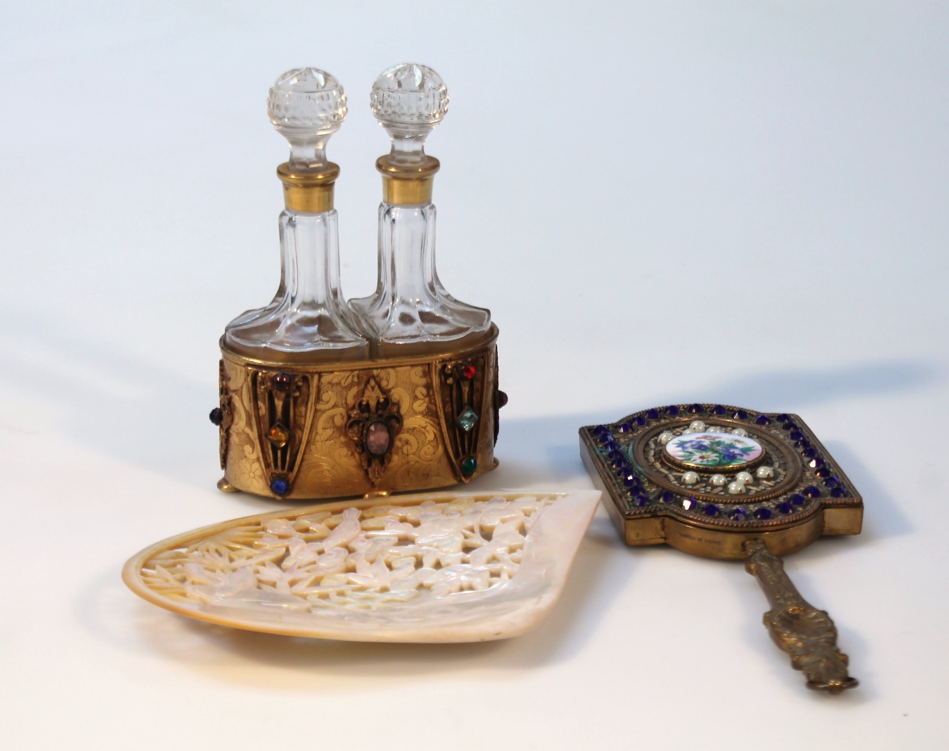 Appraisal: Various decorative items comprising a hand mirror the inverted glass