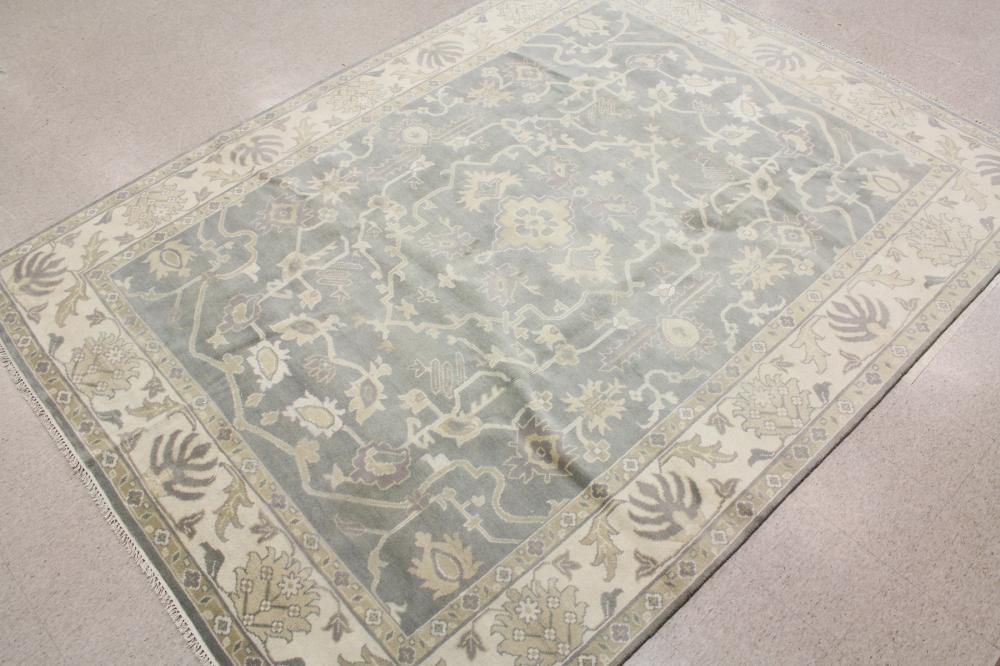 Appraisal: HAND KNOTTED ORIENTAL CARPET Indo-Persian floral tracery on gray ground