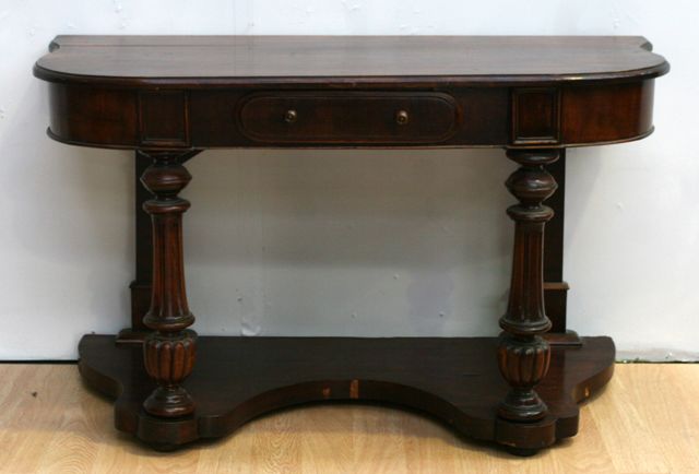 Appraisal: A Victorian walnut and stained pine console table cm wide