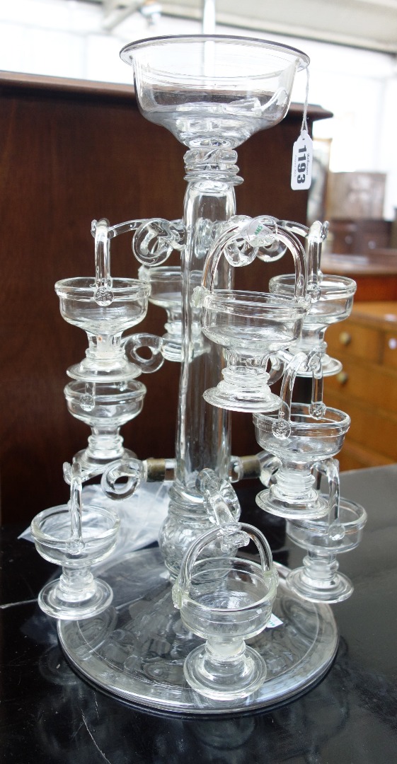 Appraisal: A glass sweetmeat centrepiece of tiered circular form th century