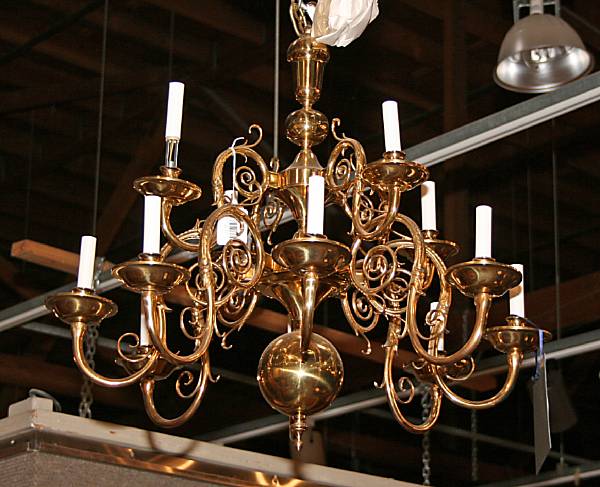 Appraisal: A Baroque style brass twelve light chandelier mid th century