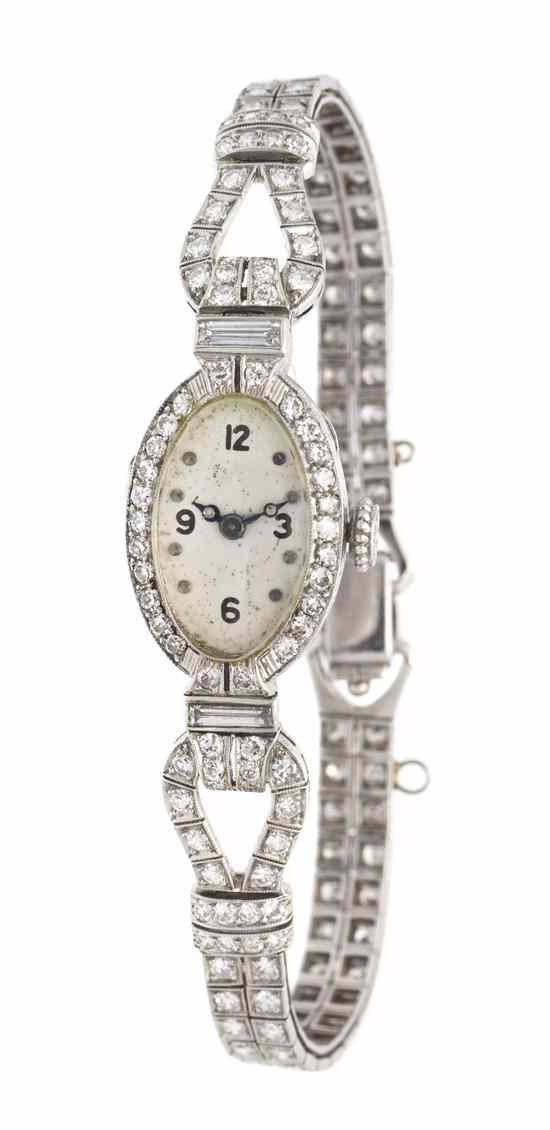 Appraisal: A Vintage Platinum and Diamond Wristwatch containing three baguette cut