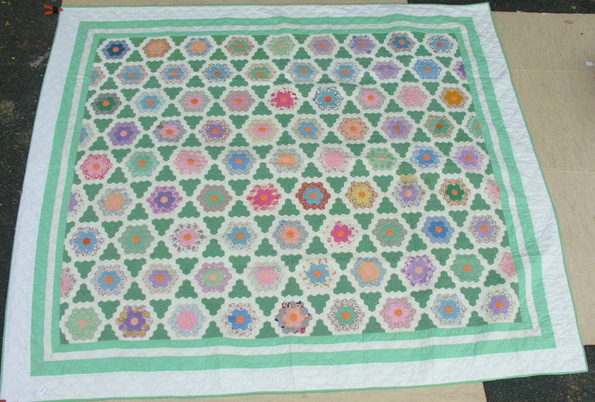 Appraisal: GRANDMOTHER FLOWER GARDEN QUILT Hand pieced and quilted About -