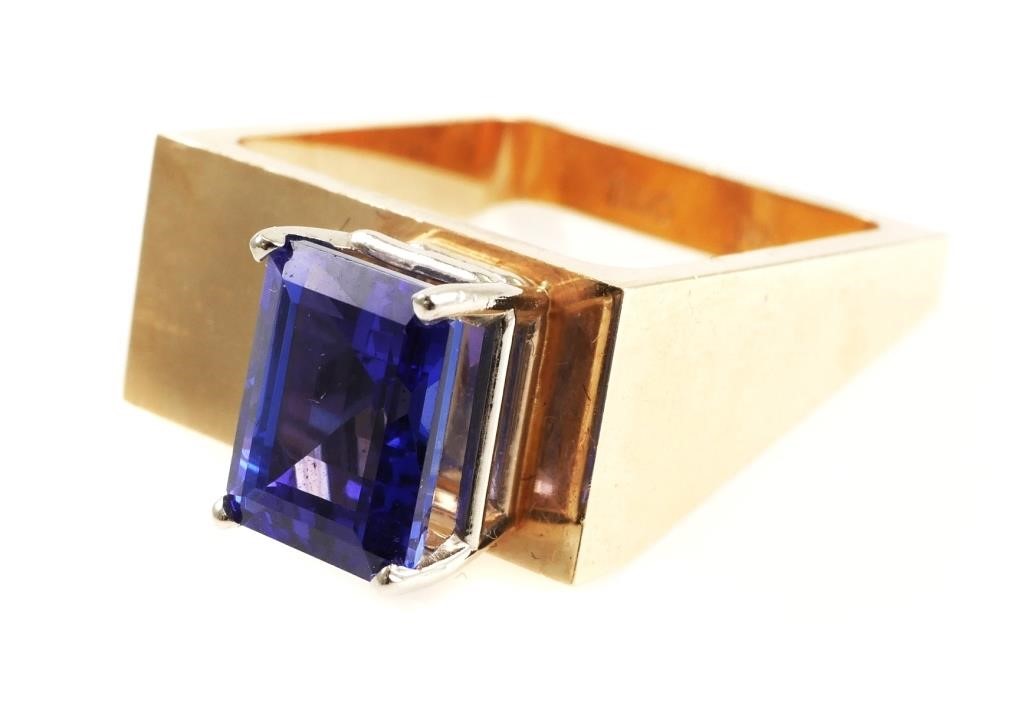 Appraisal: Modernist square ring with a -carat emerald-cut tanzanite in k