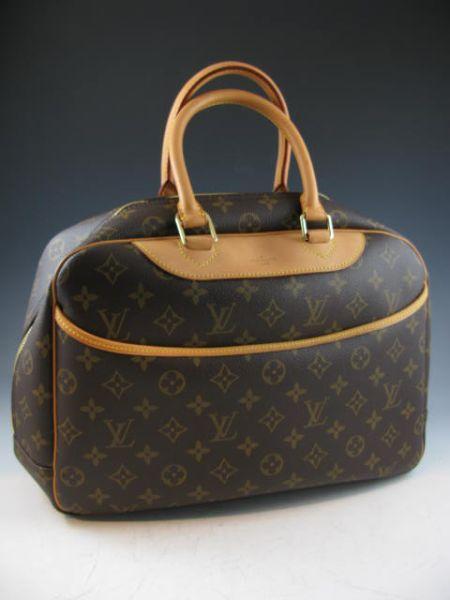 Appraisal: Louis Vuitton Monogram Deauville with double hand straps divided interior