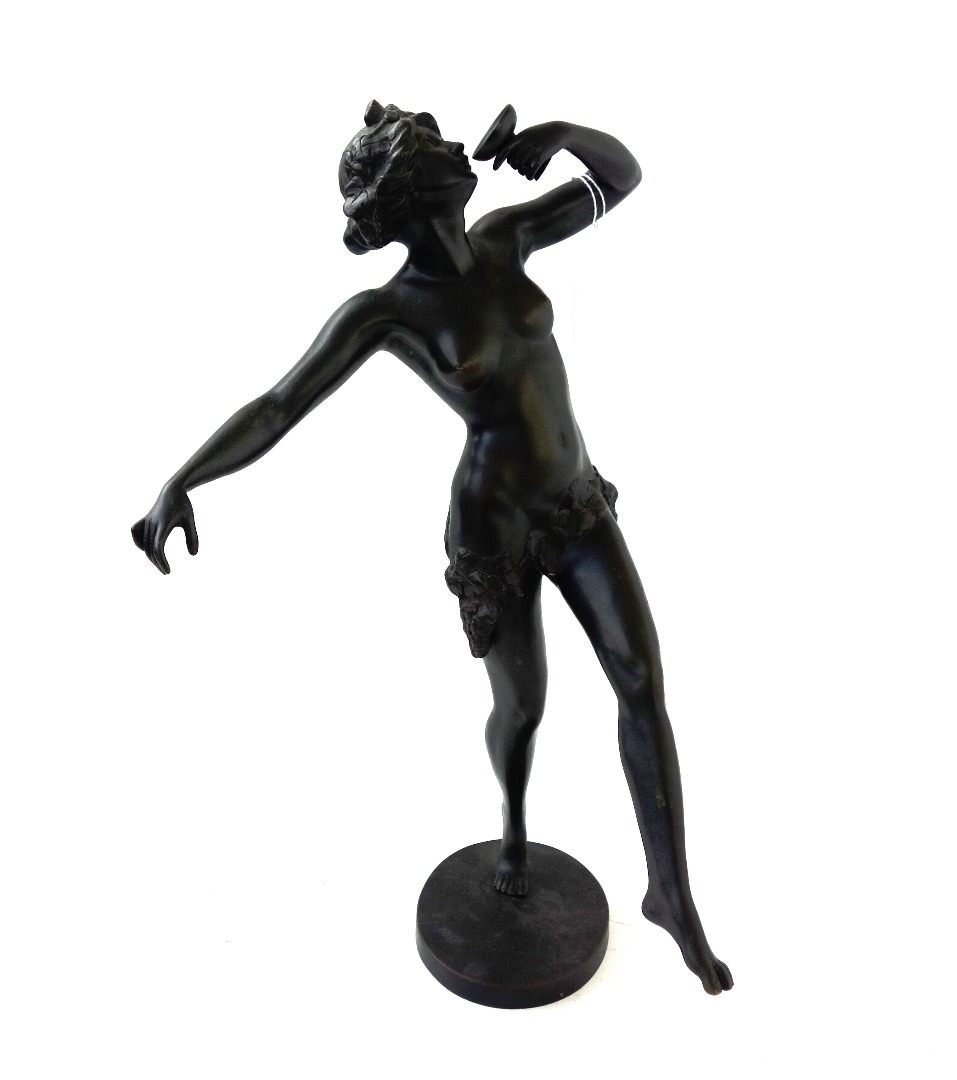 Appraisal: A patinated bronze figure th century modelled and cast as