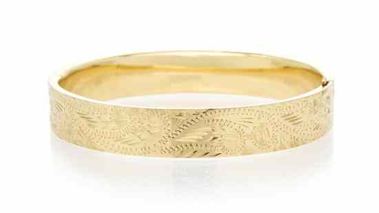 Appraisal: A Karat Yellow Gold Hinged Bangle Bracelet measuring approximately mm