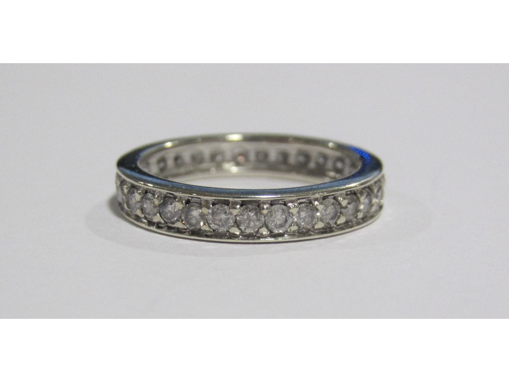 Appraisal: A white metal full hoop diamond eternity ring