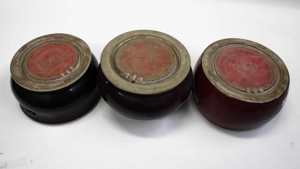 Appraisal: THREE CHINESE PORCELAIN INKSTONES each of circular form with ox