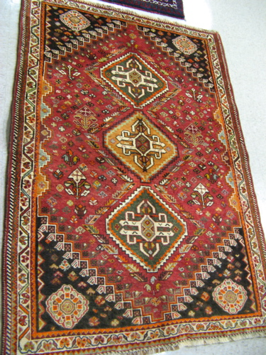 Appraisal: TWO PERSIAN SHIRAZ AREA RUGS hand knotted wool sizes '