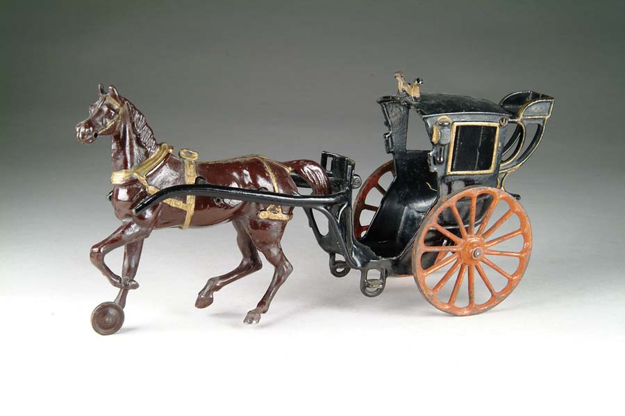 Appraisal: HANSOM CAB BY IVES Black enameled cab with an elegant