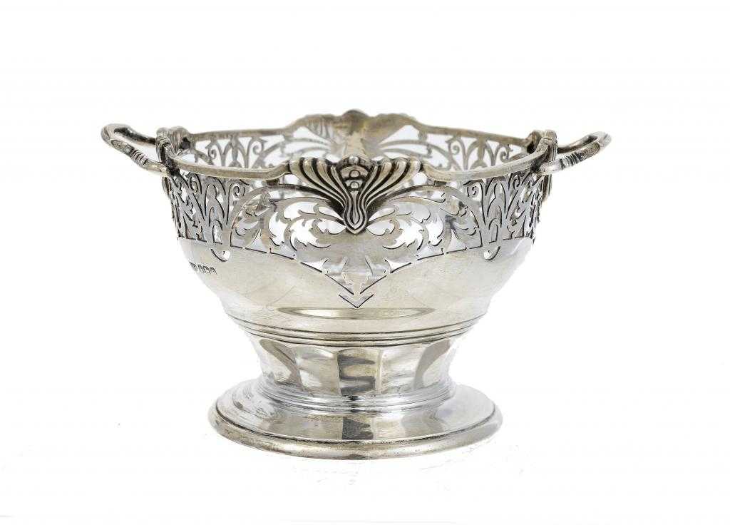 Appraisal: AN EDWARD VIII TWO HANDLED SWEETMEAT DISH with pierced border