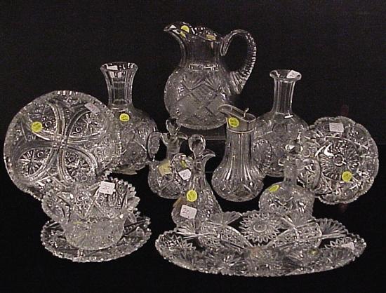 Appraisal: Cut glass pitcher two carafes three cruets two bowls celery