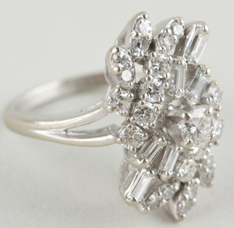 Appraisal: KT White Gold Diamond Cluster Ring with round and baguette