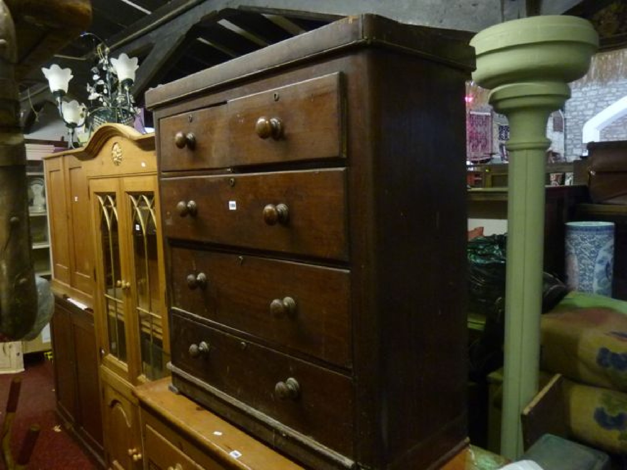 Appraisal: A Victorian mahogany veneered bedroom chest of three long and