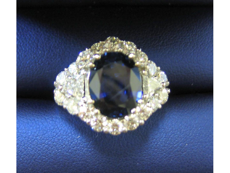 Appraisal: SAPPHIRE AND DIAMOND RING k white gold ring centering one