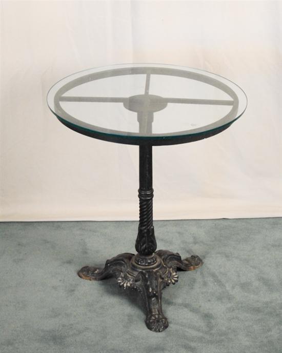 Appraisal: A th C Cast-iron Table painted black and with a