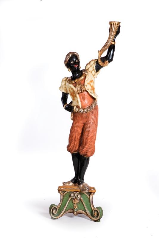 Appraisal: BLACKAMOOR Twentieth century hardwood Carved figure holding a gilt cornucopia