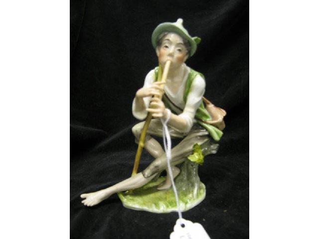 Appraisal: German Porcelain Figurine of a Flute Player seated on stump