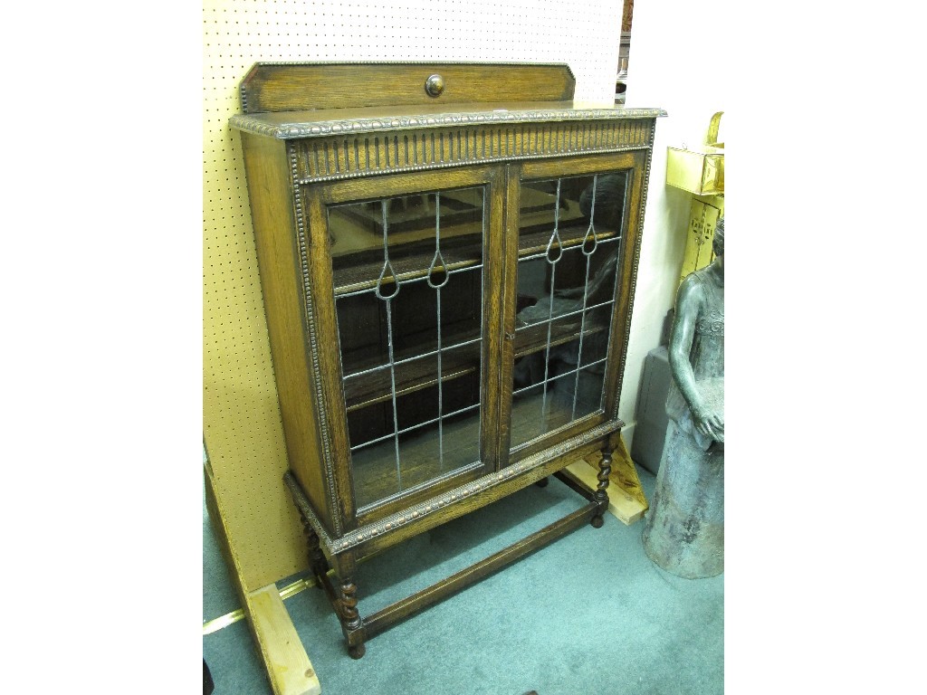 Appraisal: Oak glazed two door bookcase