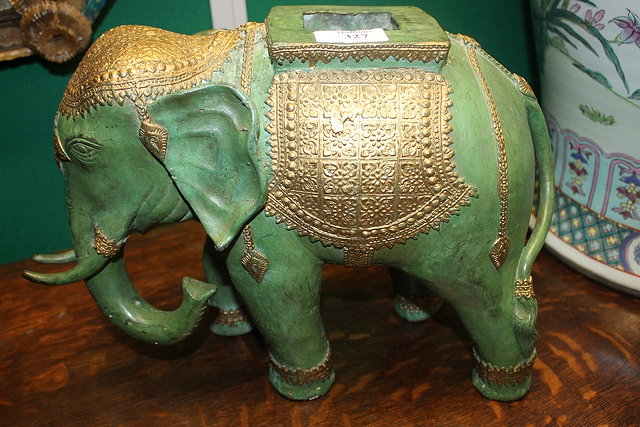 Appraisal: A GREEN PAINTED BRONZE METAL MODEL of an elephant cm