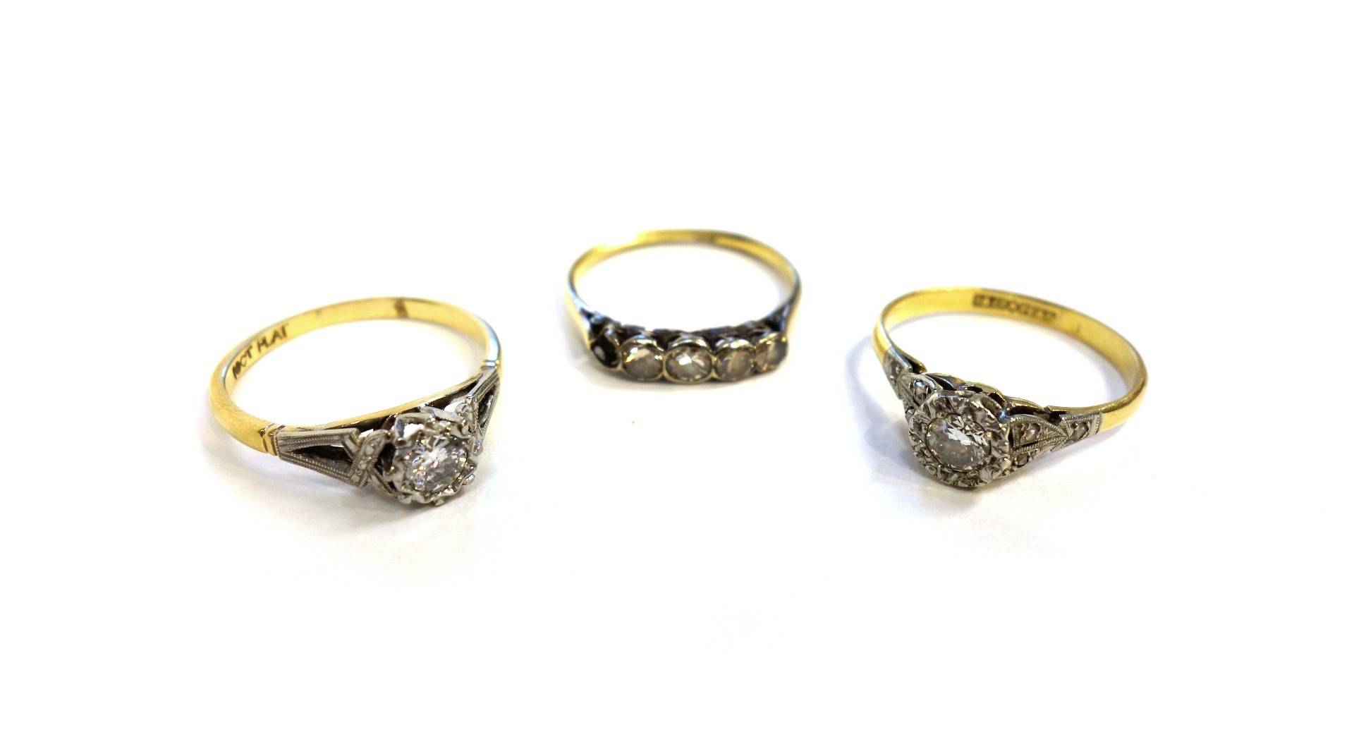 Appraisal: A gold and platinum diamond set single stone ring mounted