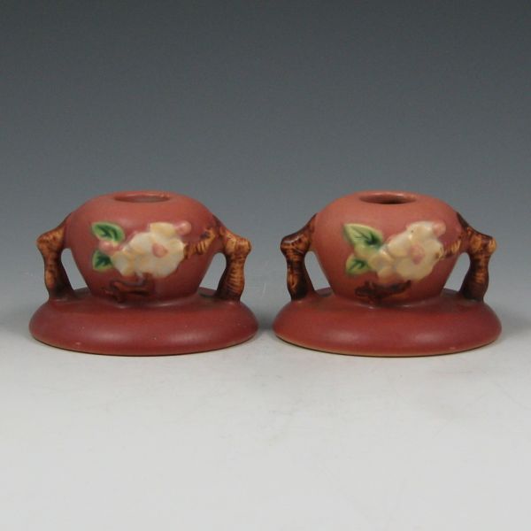 Appraisal: Pair of pink Roseville Apple Blossom candleholders Marked Roseville USA