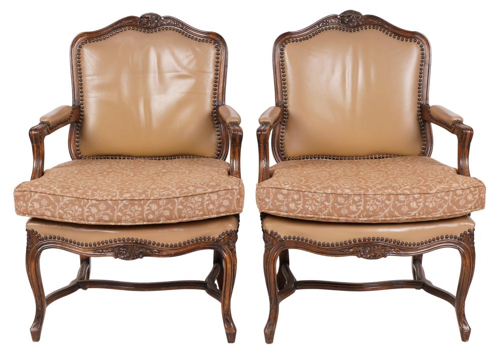 Appraisal: PAIR OF LOUIS XV STYLE ARMCHAIRSwith studded leather backs and