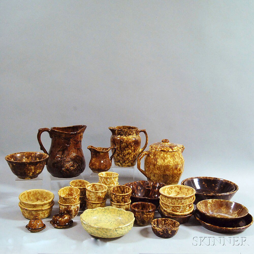 Appraisal: Thirty-one Pieces of Rockingham-glazed Pottery th th century including three