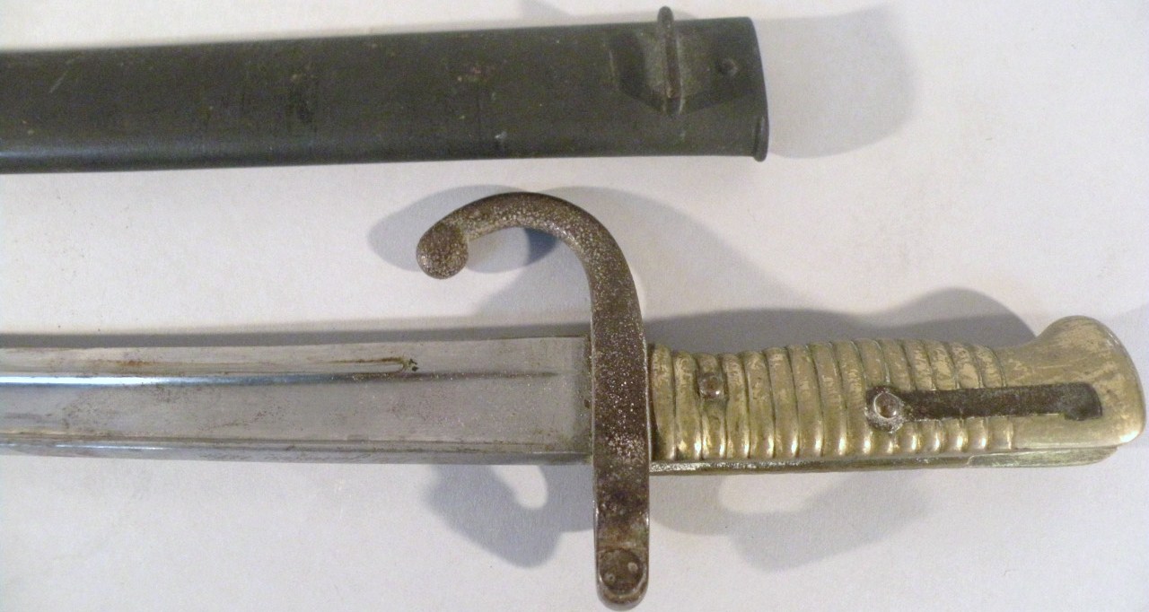 Appraisal: A late thC French bayonet and scabbard with tapering blade