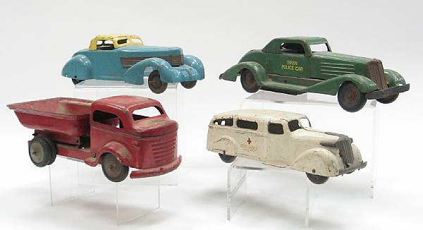 Appraisal: American metal cars Grouping of American vehicles from Marx Hubley