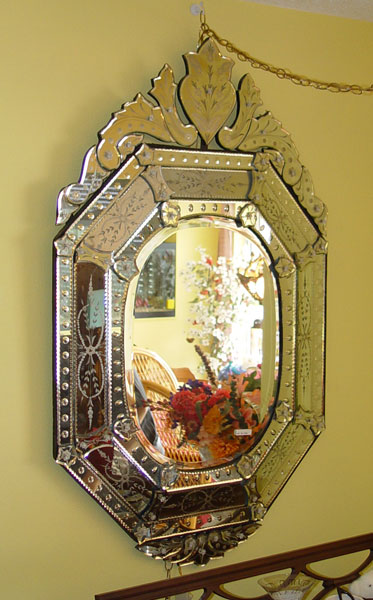 Appraisal: VENETIAN STYLE MIRROR Beveled glass frame crest and looking glass