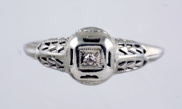 Appraisal: White gold diamond filigree ring Marked K ct center diamond