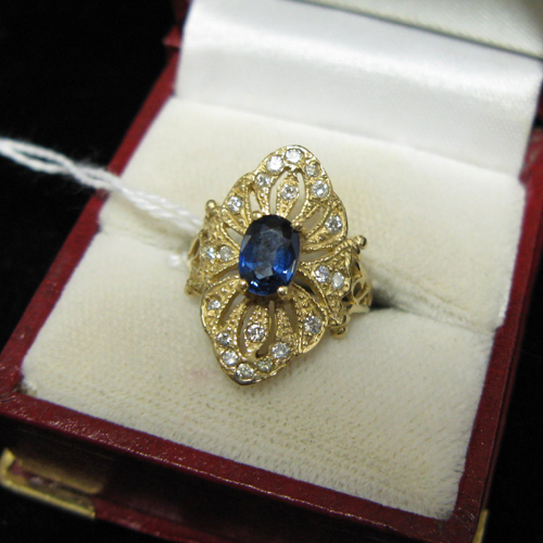 Appraisal: BLUE SAPPHIRE DIAMOND AND FOURTEEN KARAT GOLD RING The old