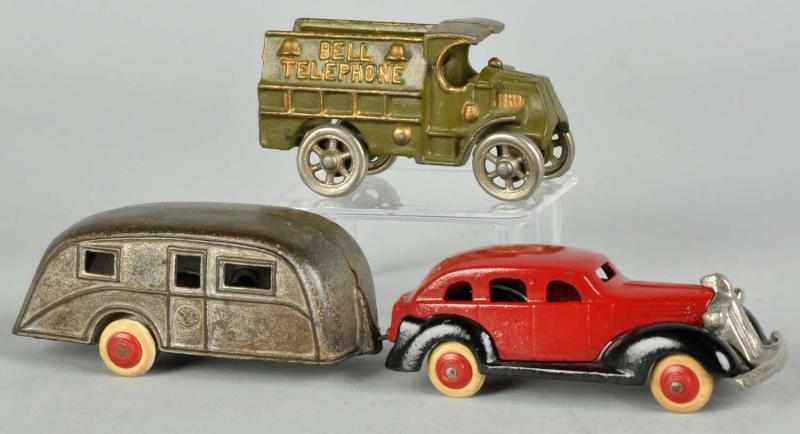 Appraisal: Lot of Cast Iron Vehicle Toys Description American Includes one