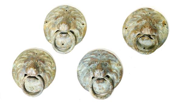 Appraisal: LION HEAD DOOR MOUNTS probably Roman - century A D