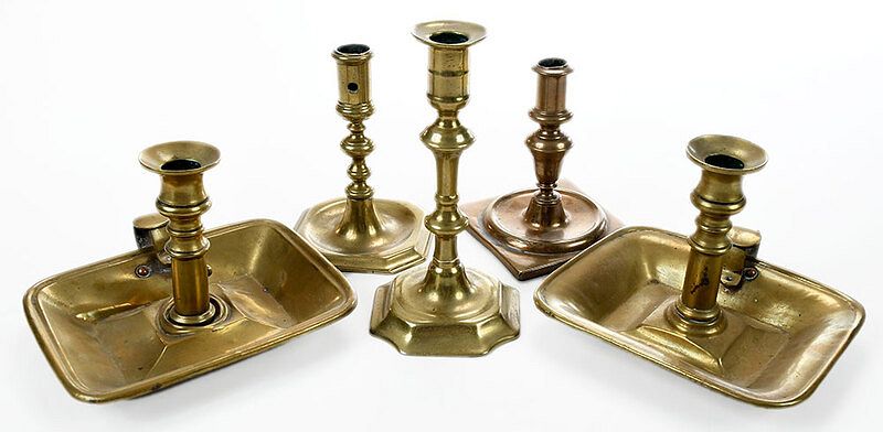 Appraisal: Five Brass Candlesticks British German th th century one square