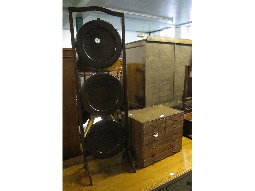 Appraisal: Lot comprising miniature chest of drawers and a cakestand