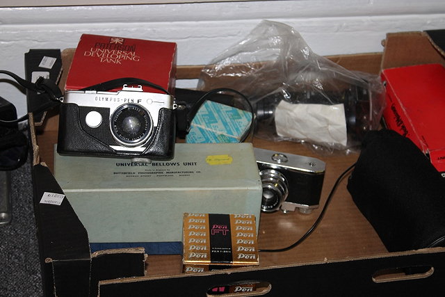 Appraisal: A COLLECTION OF CAMERAS AND ACCESSORIES to include an Olympus