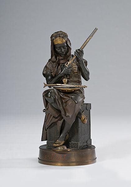 Appraisal: BRONZE TUNISIAN MERCHANT BY EMILE EDMOND PEYNOT - Marchand Tunisien