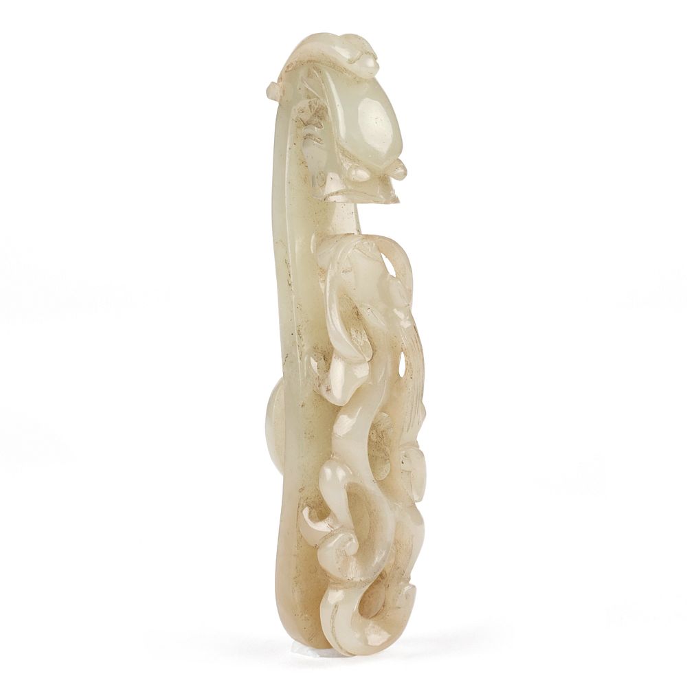 Appraisal: Chinese Carved White Jade Dragon Belt Hook Chinese delicately carved