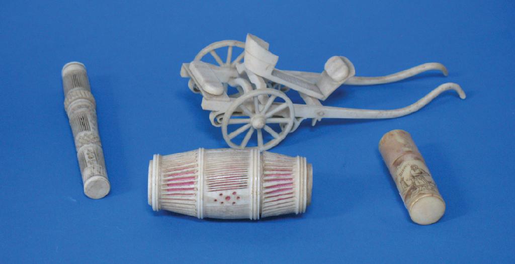 Appraisal: A CARVED IVORY MODEL OF A CART a barrel shaped