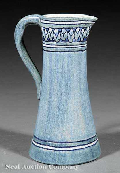 Appraisal: A Newcomb College Art Pottery High Glaze Pitcher decorated by