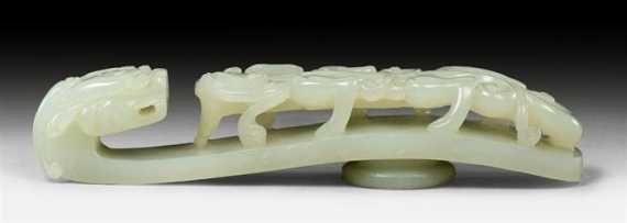 Appraisal: A FINE LIGHT CELADON JADE BELT HOOK WITH DRAGON HEAD