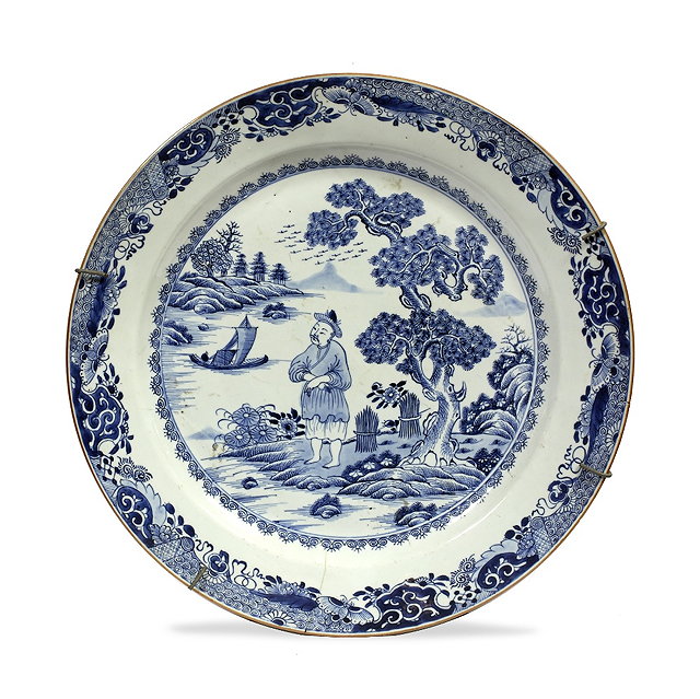 Appraisal: A Chinese blue and white porcelain charger th Centurya scholar