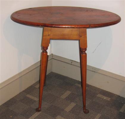 Appraisal: Cherry tavern table th century Having an oval top straight