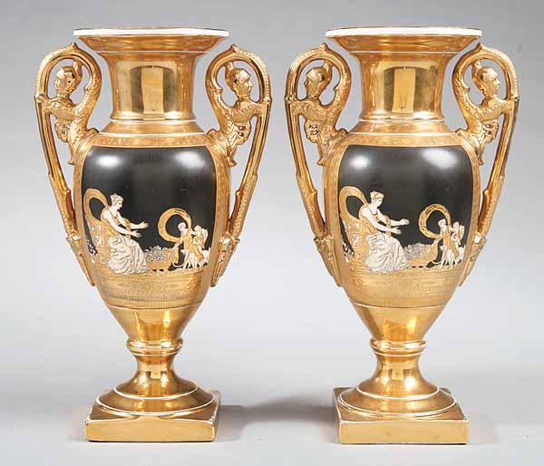 Appraisal: A Pair of Heavily Gilt Porcelain Urns bearing spurious KPM