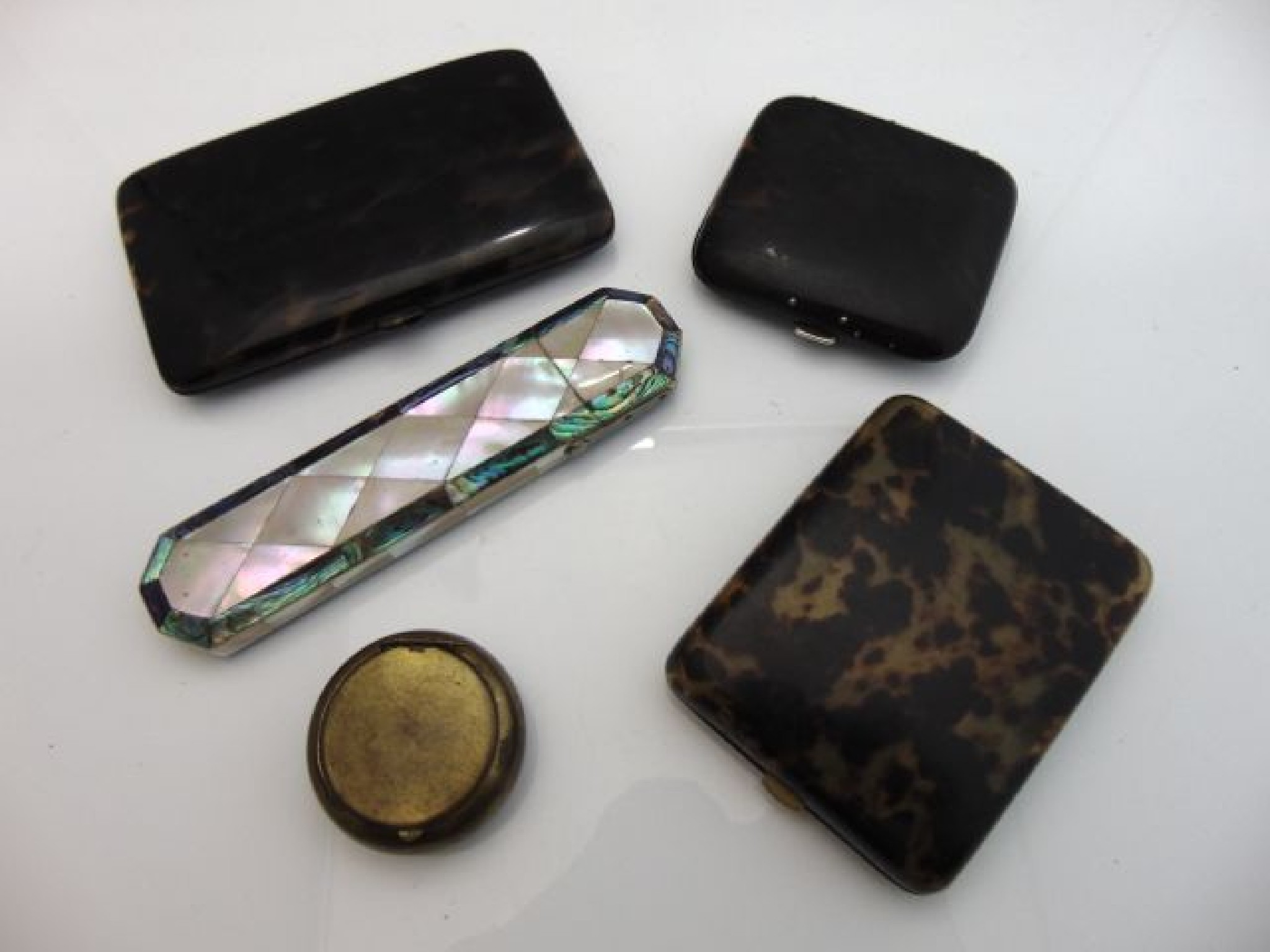 Appraisal: A th century mother-of-pearl spectacle case tortoishell cigaratte case two