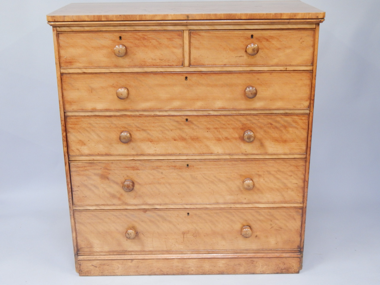 Appraisal: A Victorian satin birch chest of drawers the top with